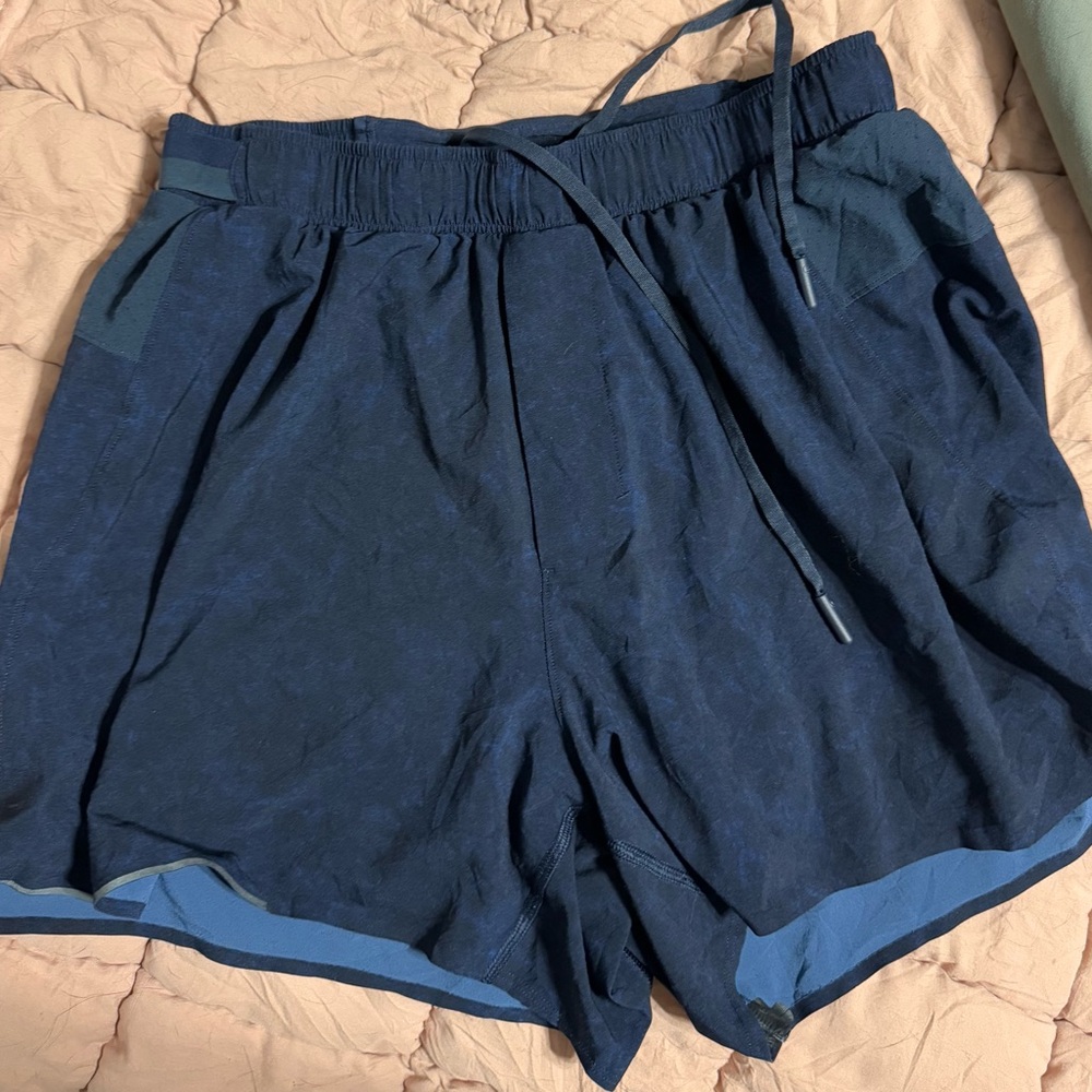 Navy Blue 4 inch Lululemon surge shorts. Size medium